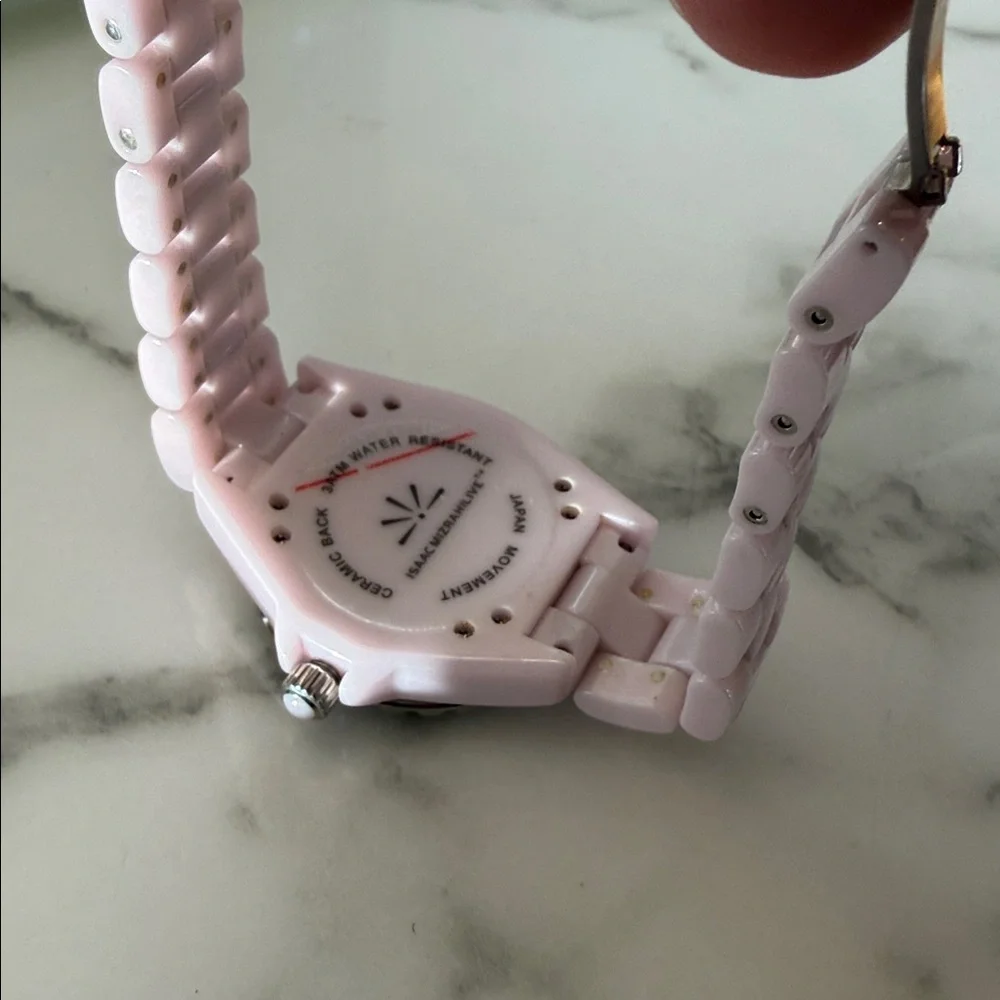 Isaac Mizrahi Live women’s pink sport watch with bracelet style band